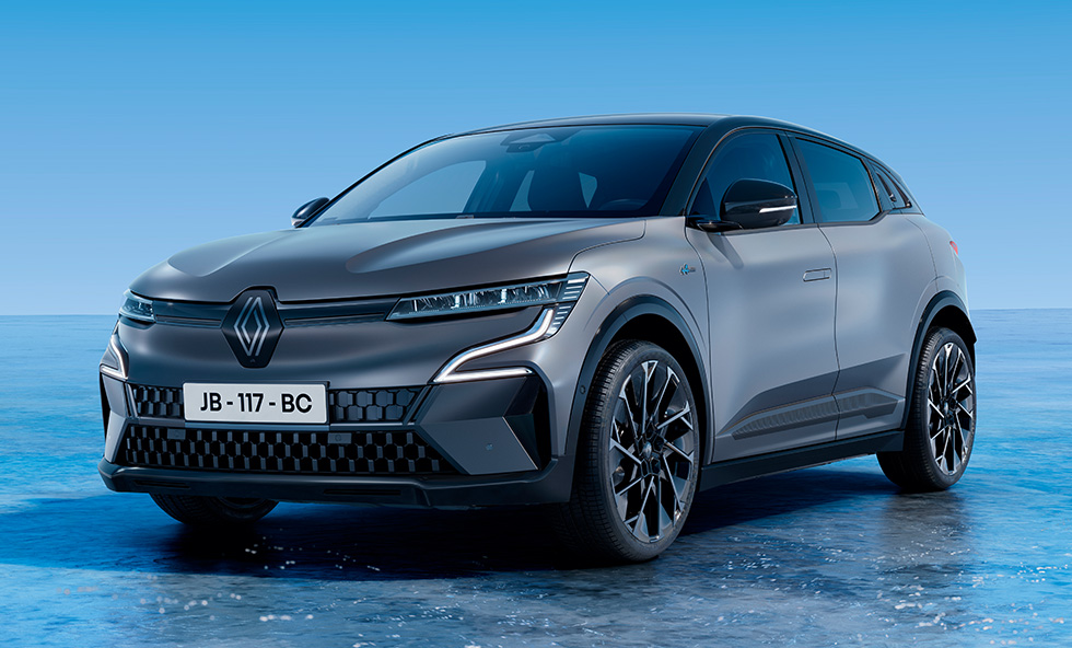 Renault Megane E-Tech electric in grey front three-quarter shot on a blue studio background