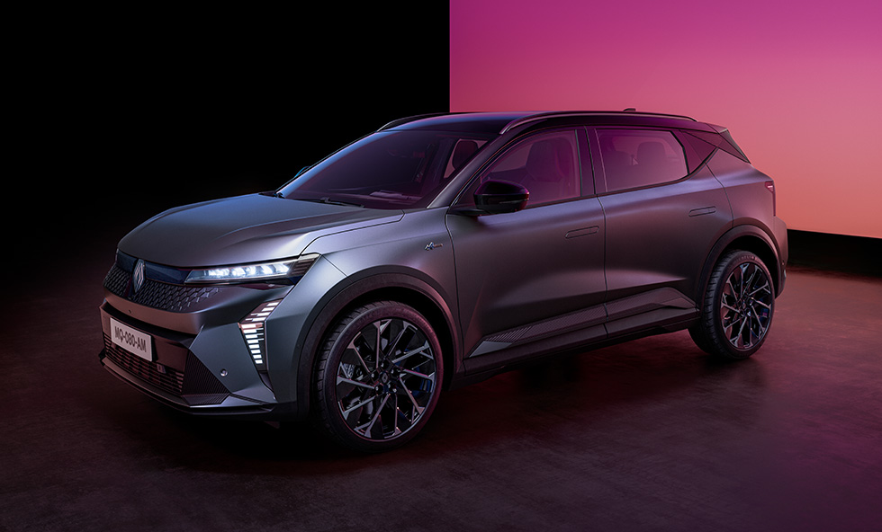 Renault Scenic E-Tech electric in grey front three-quarter shot on a studio background