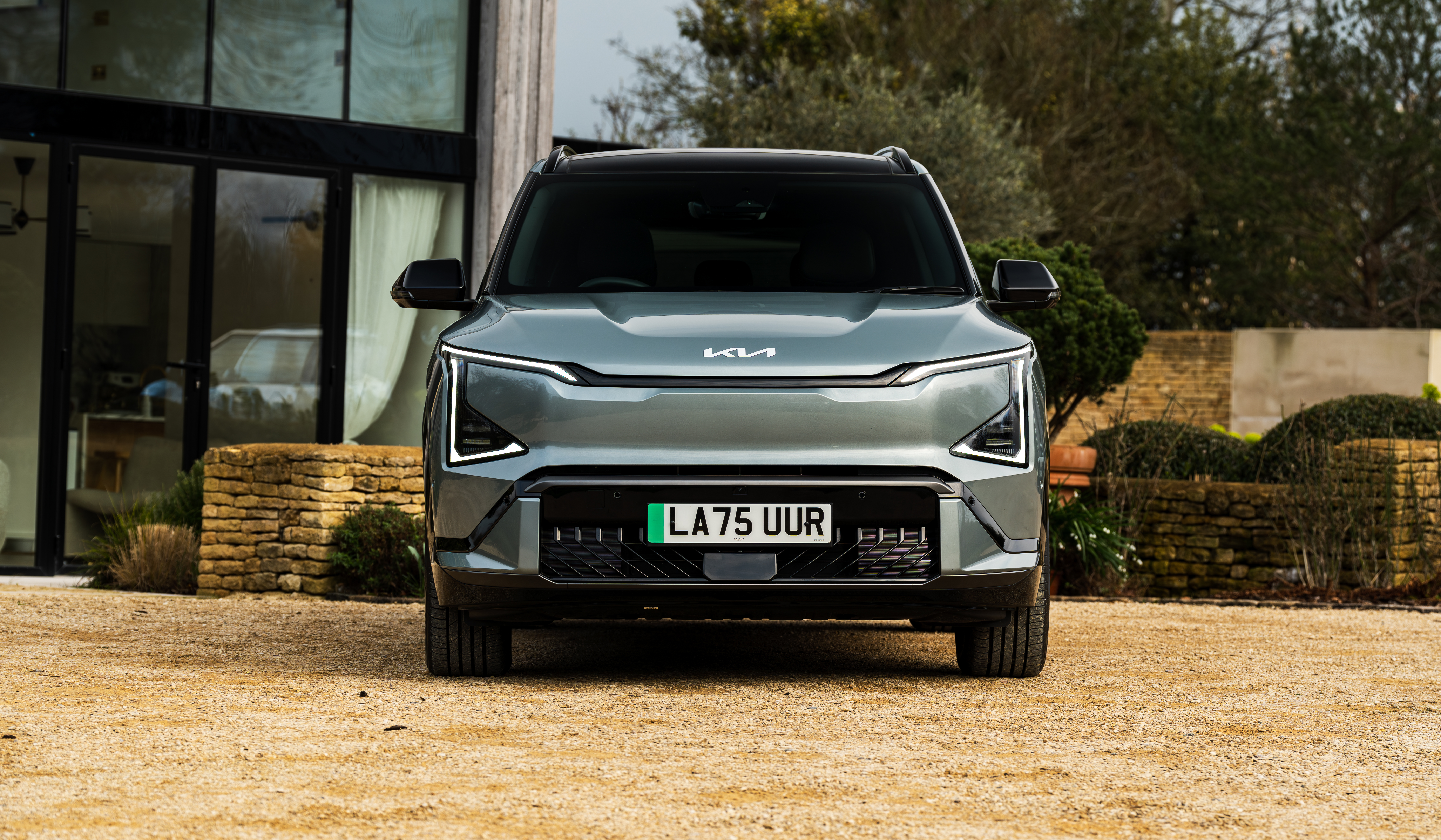 Front-on shot of the Kia EV5 in green