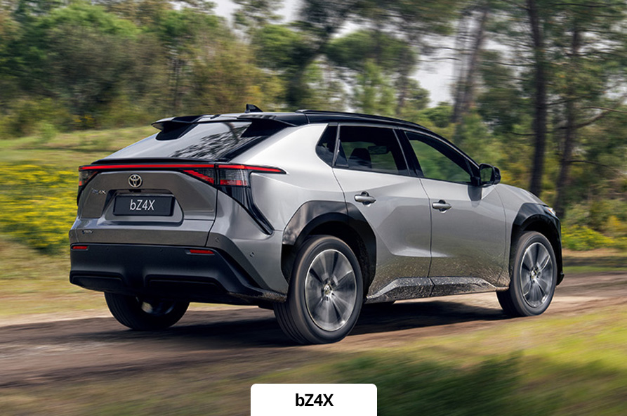 Toyota bZ4X driving through the country