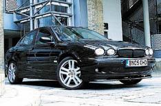 British trade minister keeps his Jag