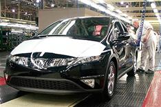 Honda cut pay to save jobs