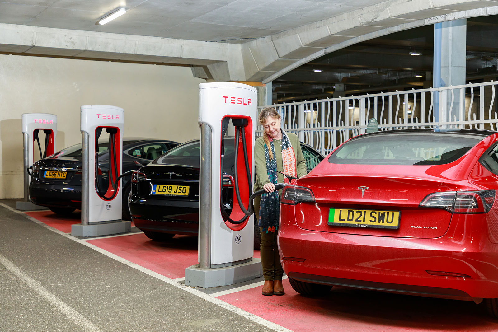 Tesla charging station with Model 3 21-plate
