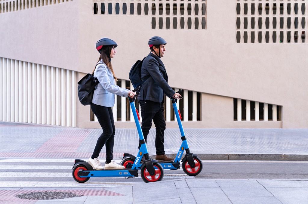People riding escooter