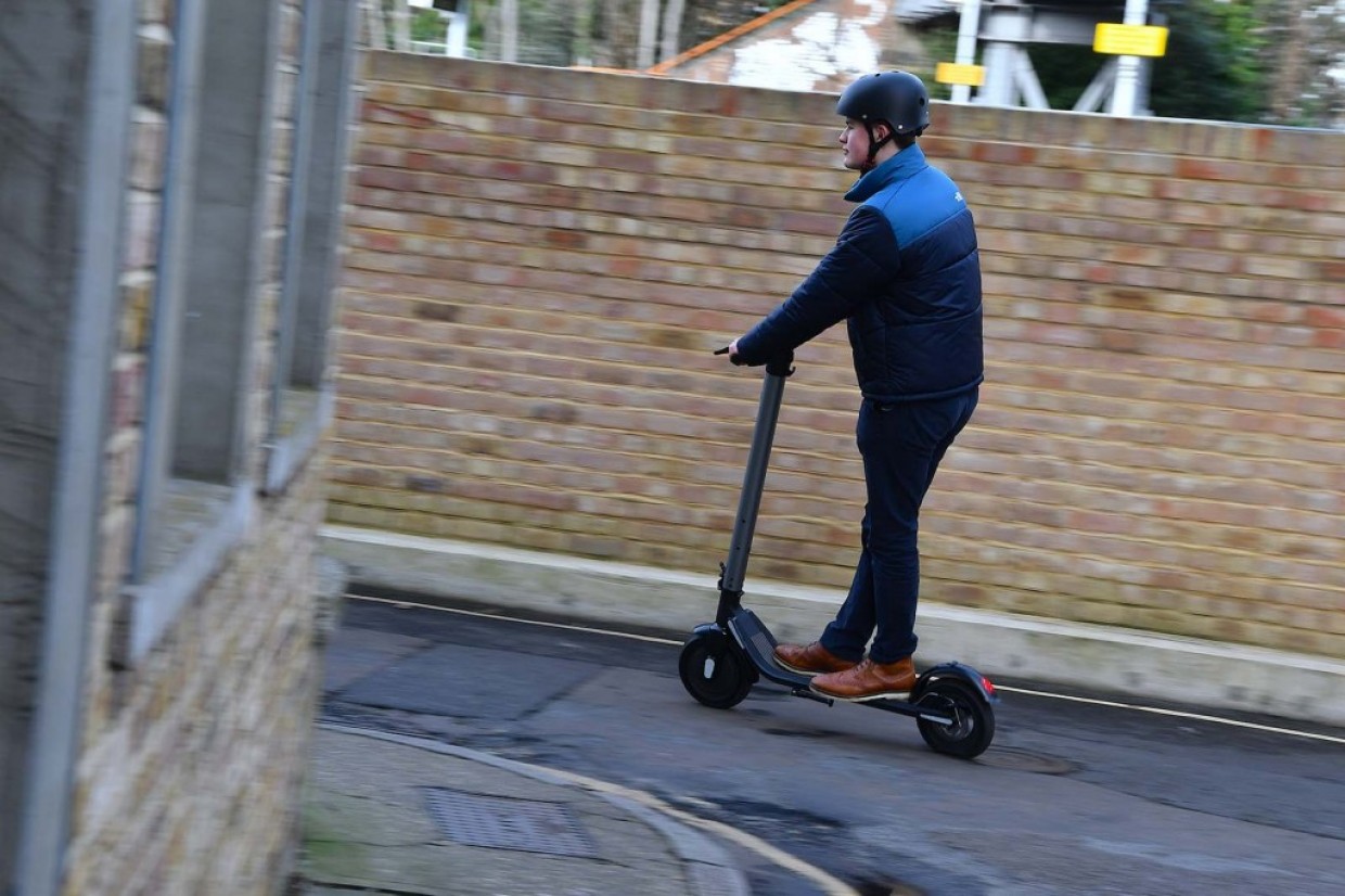 Riding an e-scooter 