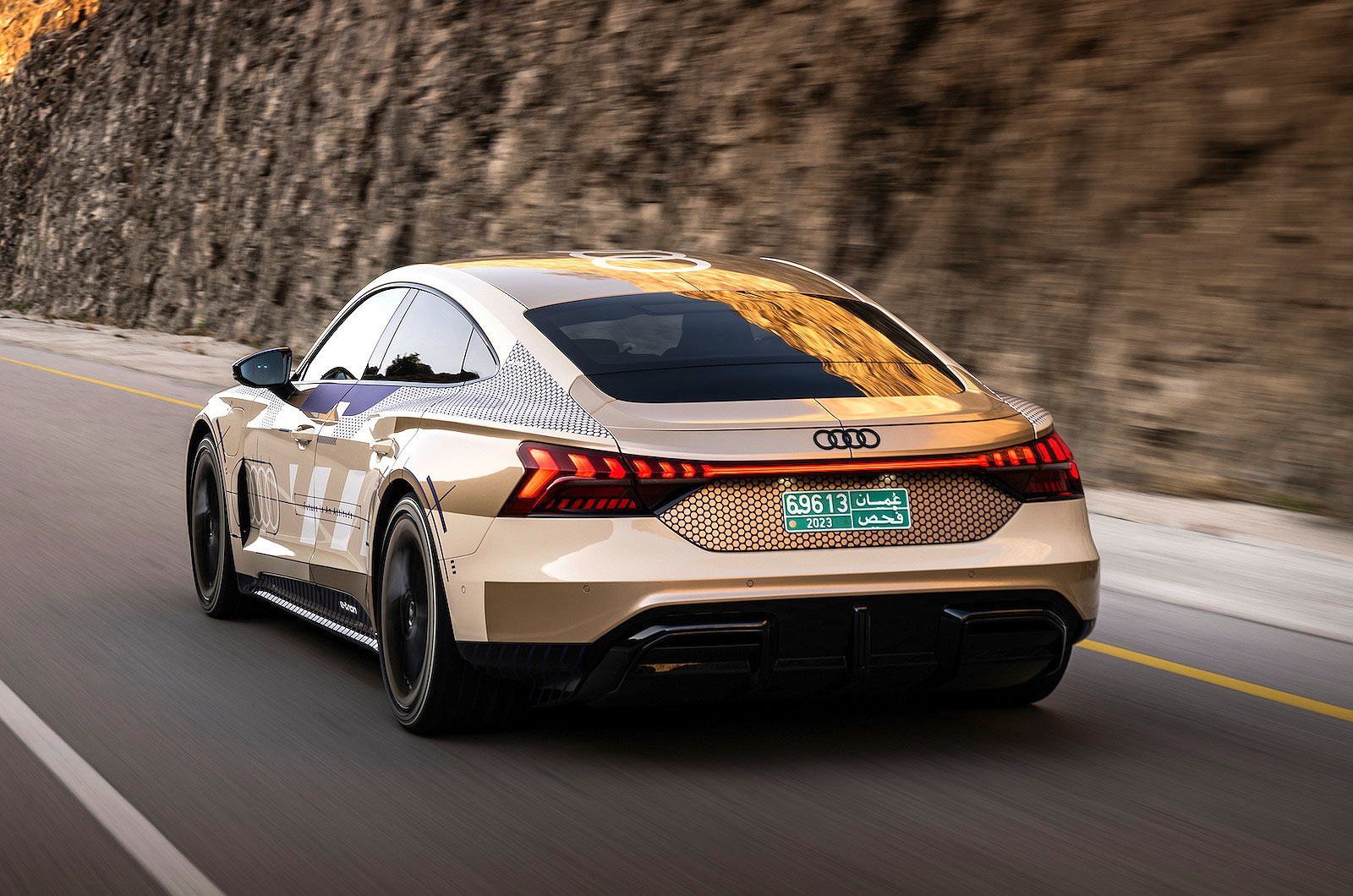 Audi e-tron GT rear left driving