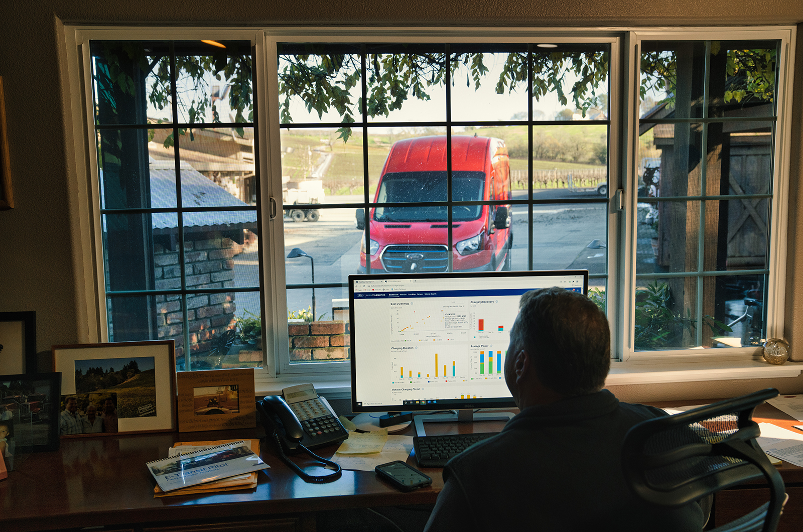 Man analysing Ford Pro data at desktop