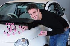 Man to paint car with nail varnish