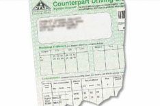Two jailed for taking 18 driving tests