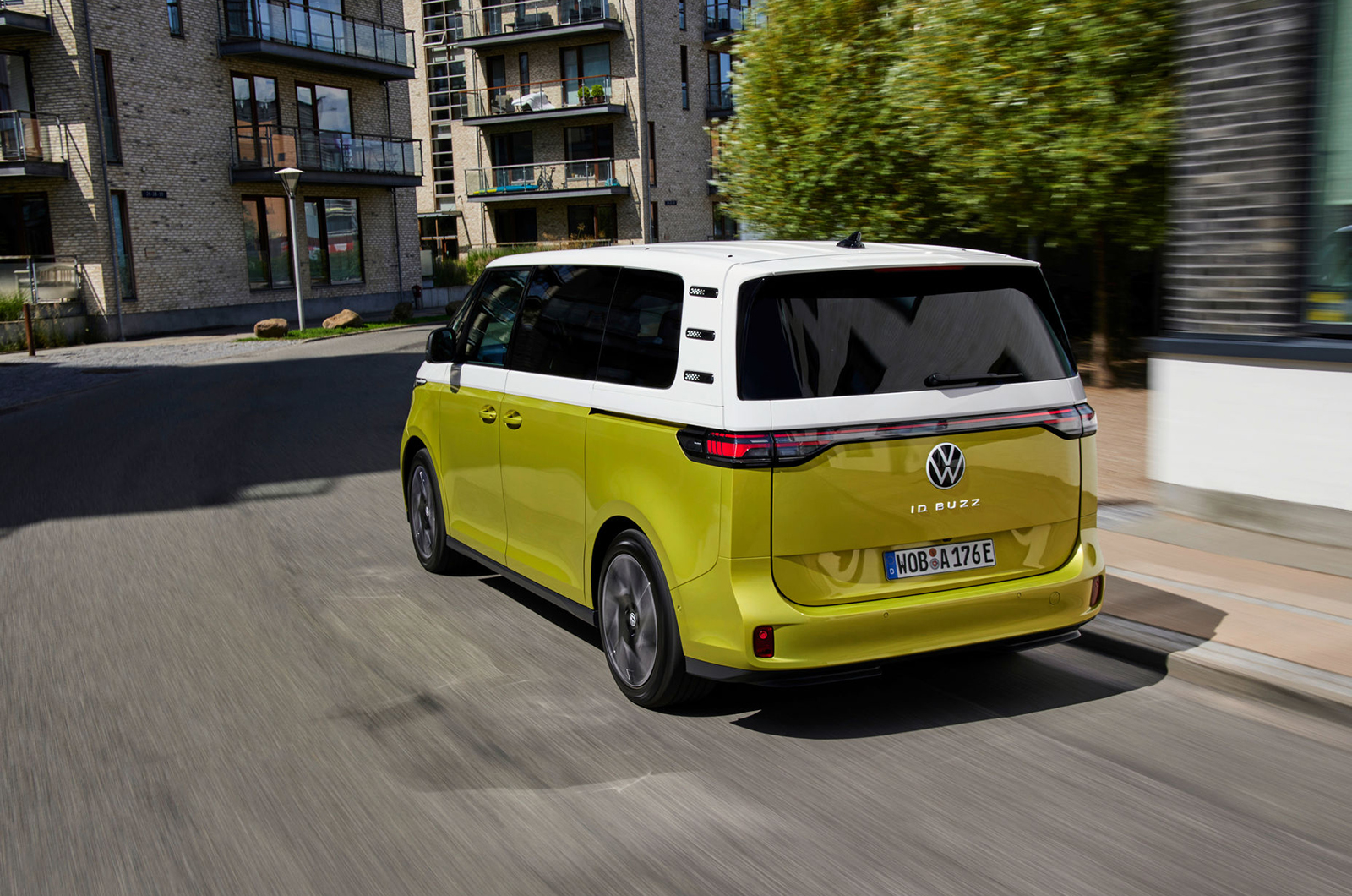 Volkswagen ID. Buzz rear three quarters on the road