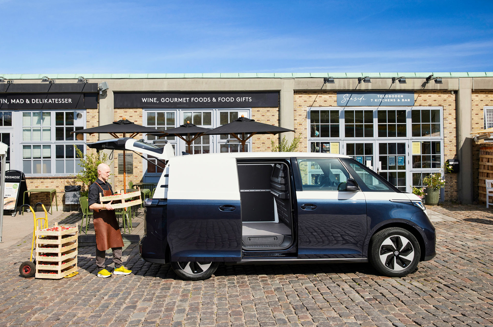 Volkswagen ID. Buzz Cargo side profile being loaded with goods