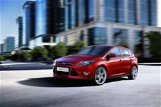 Ford cuts prices by up to 11%