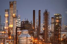 Refinery strikers threaten more action