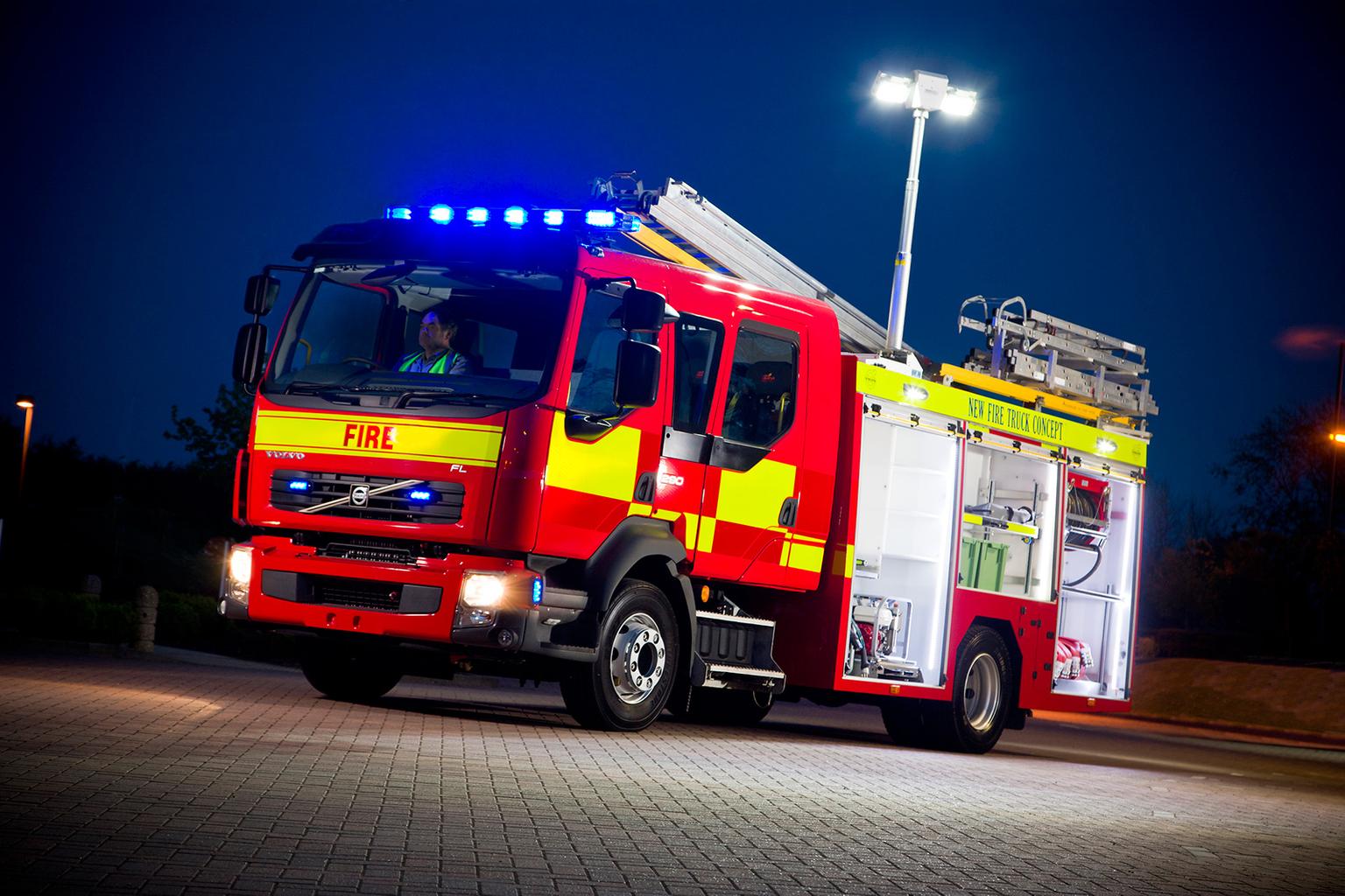 What should I do when there's an emergency vehicle behind me?