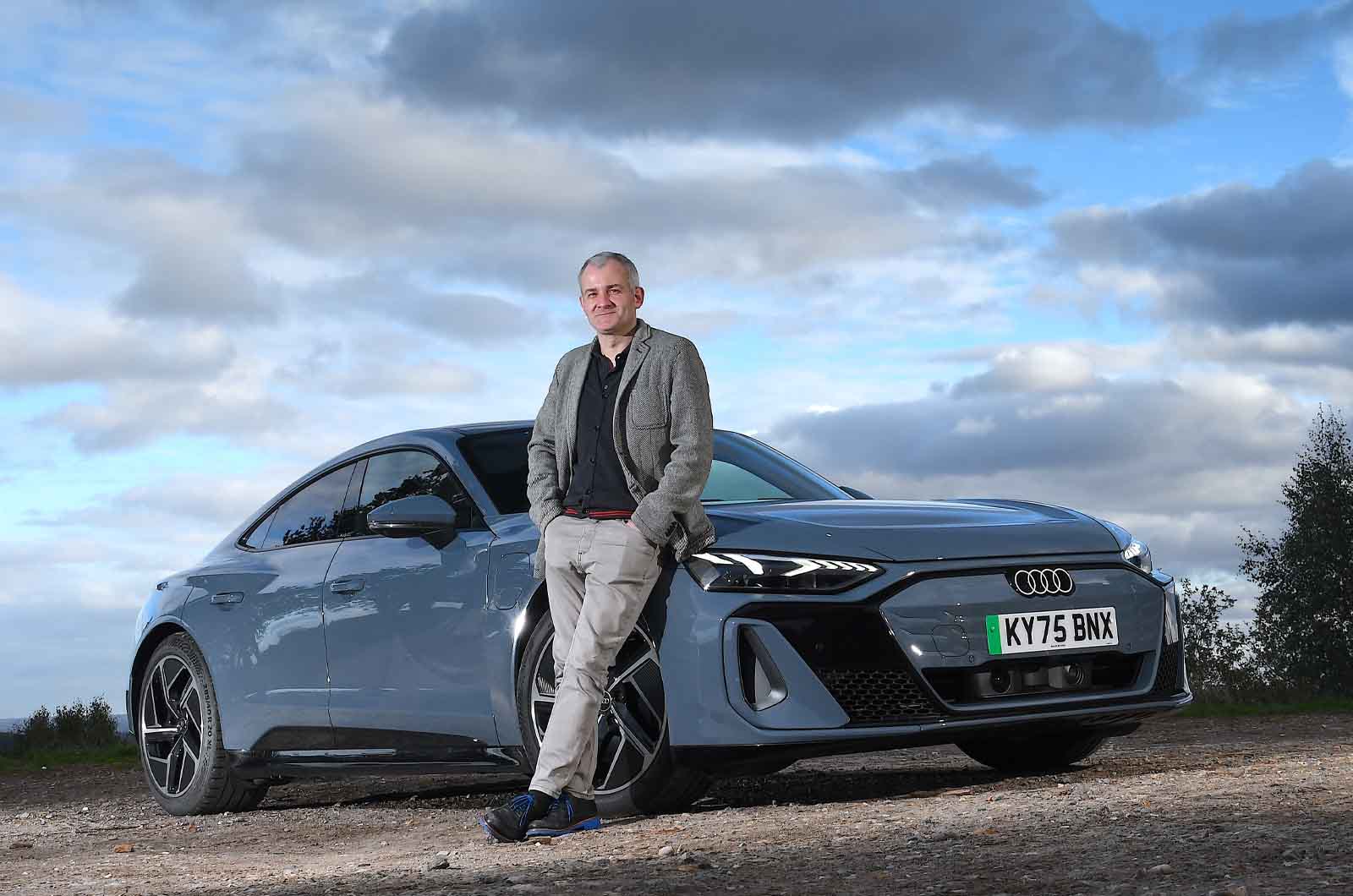 Audi E-tron GT LT with person standing in front of it