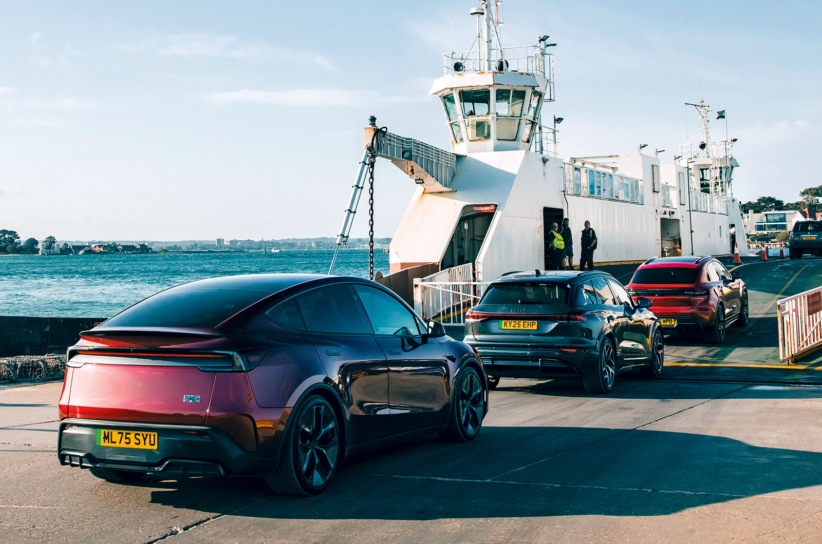 Cars getting onto ferry
