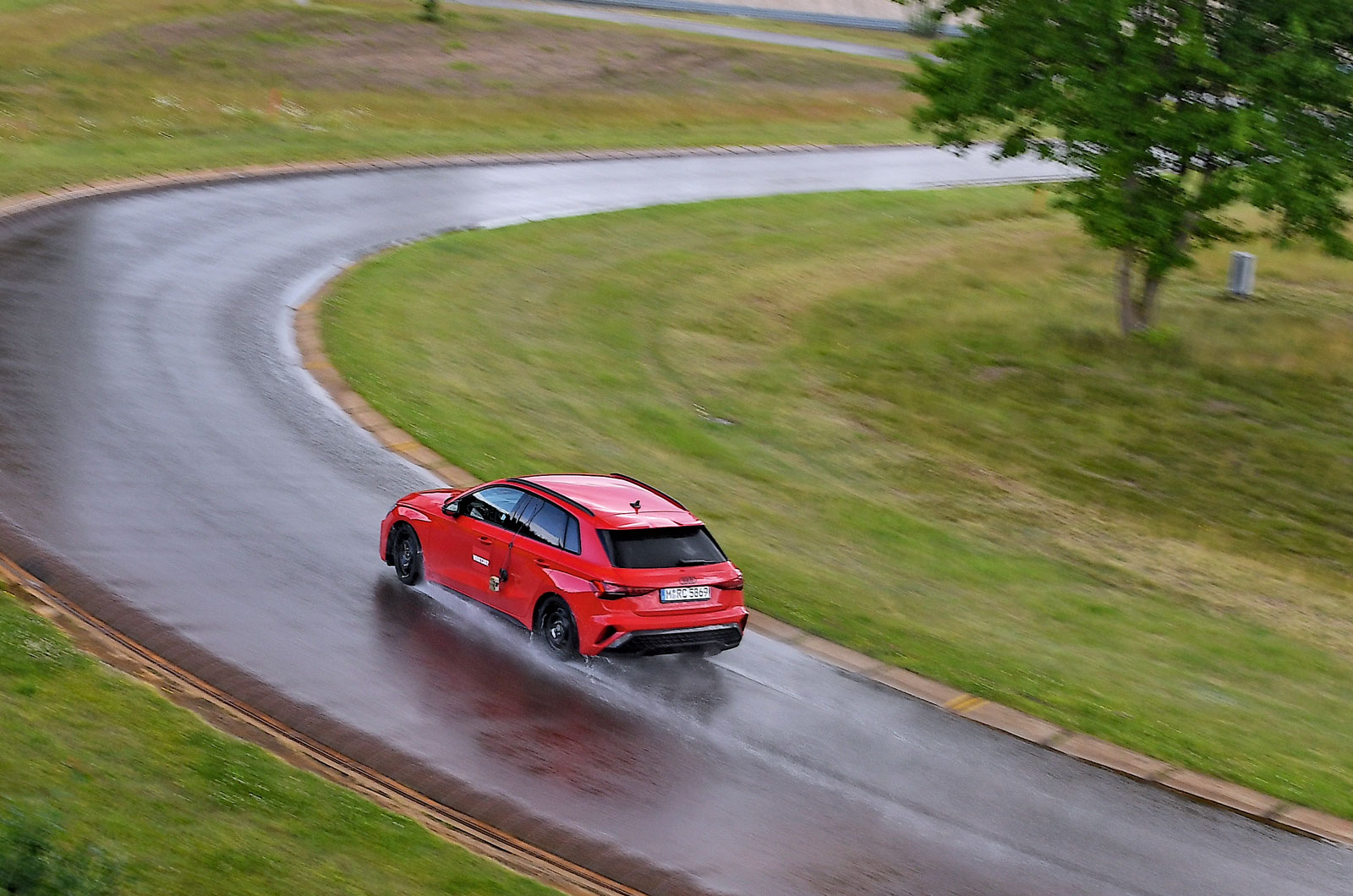 Audi A3 on wet test track