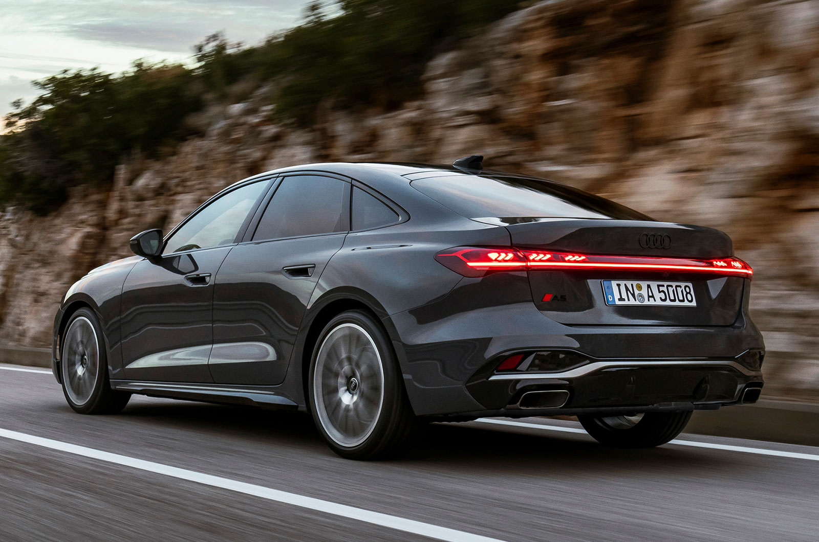 Audi A5 saloon grey driving rear
