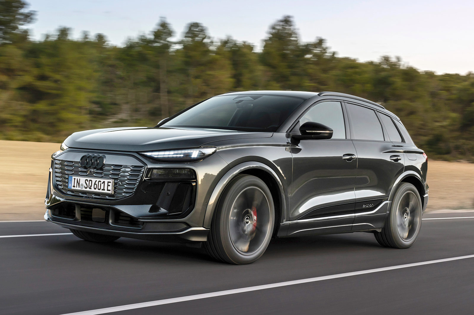 Audi SQ6 e-tron front driving, grey