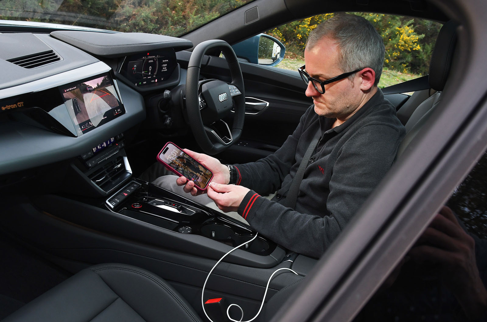Audi E-tron GT LT plugging in phone