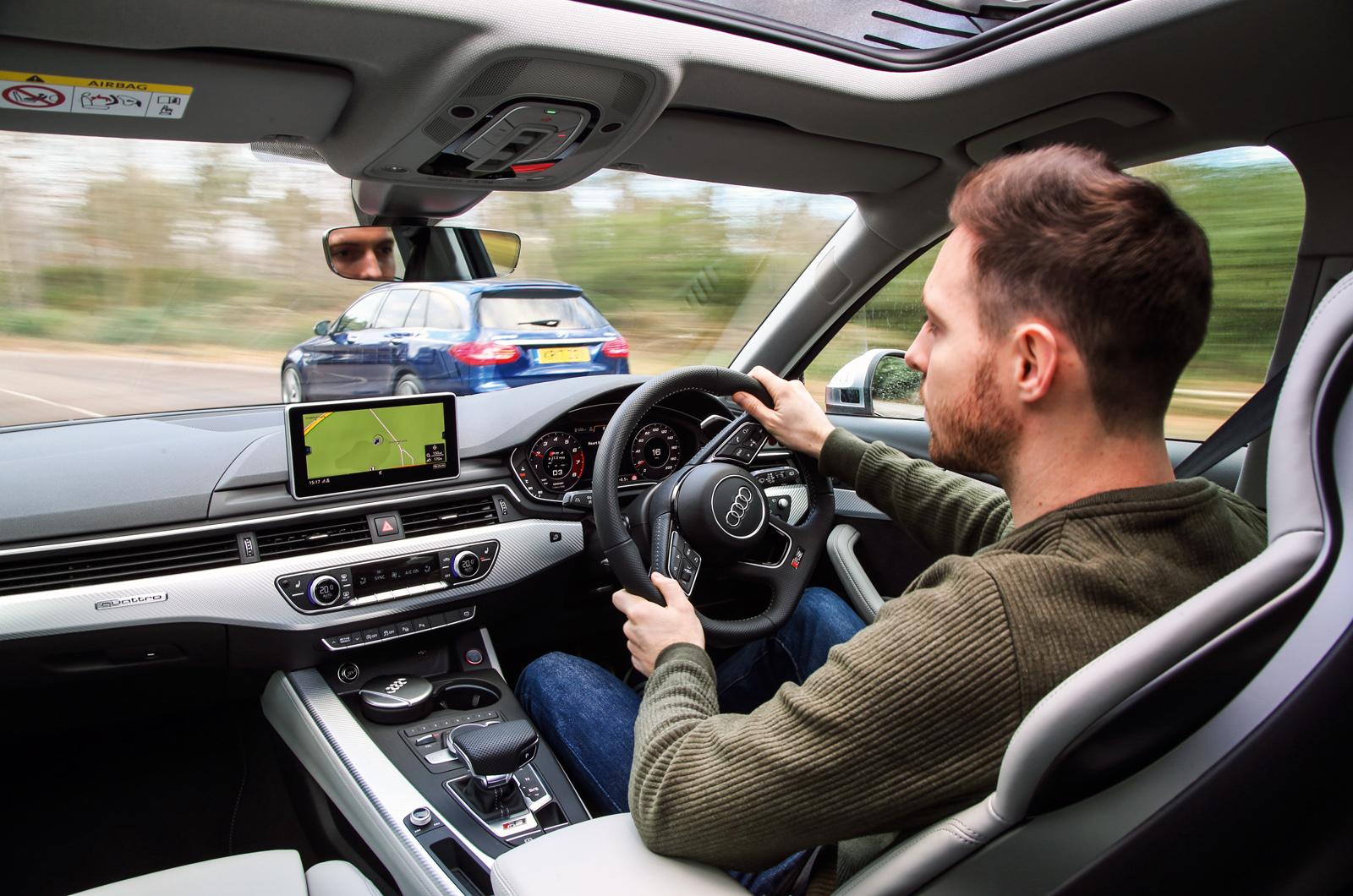Audi RS4 Avant vs Mercedes-AMG C63 S Estate behind the wheel