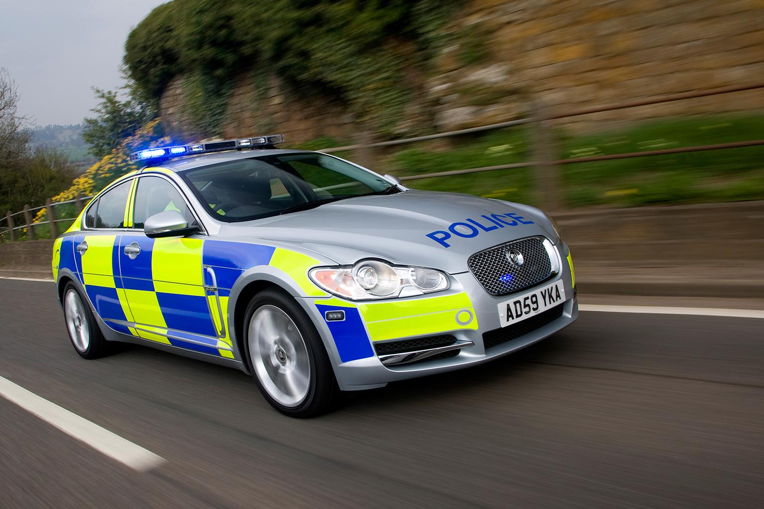 What should I do when there's an emergency vehicle behind me?