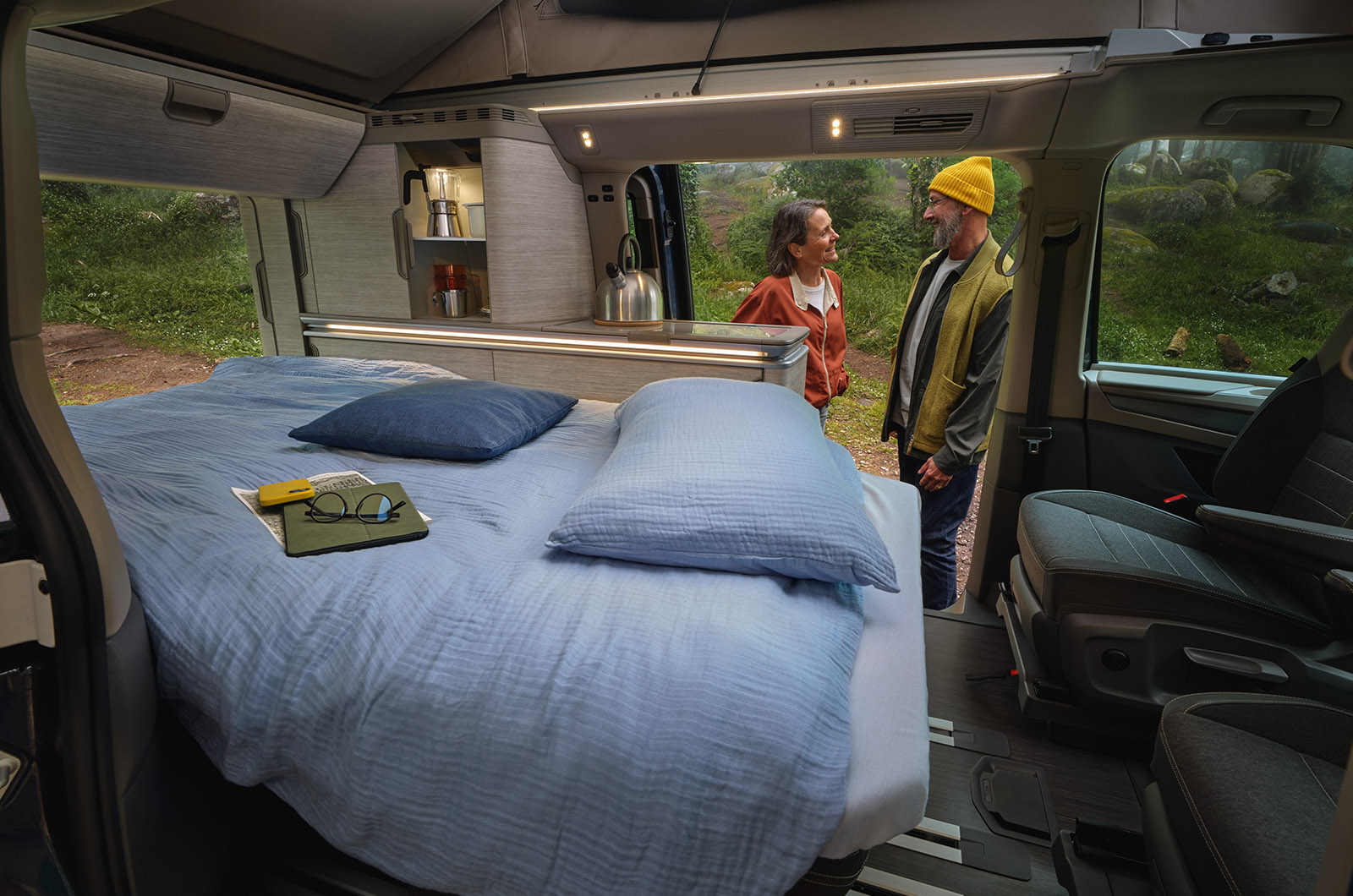 An interior shot of a Volkswagen California showing a double bed