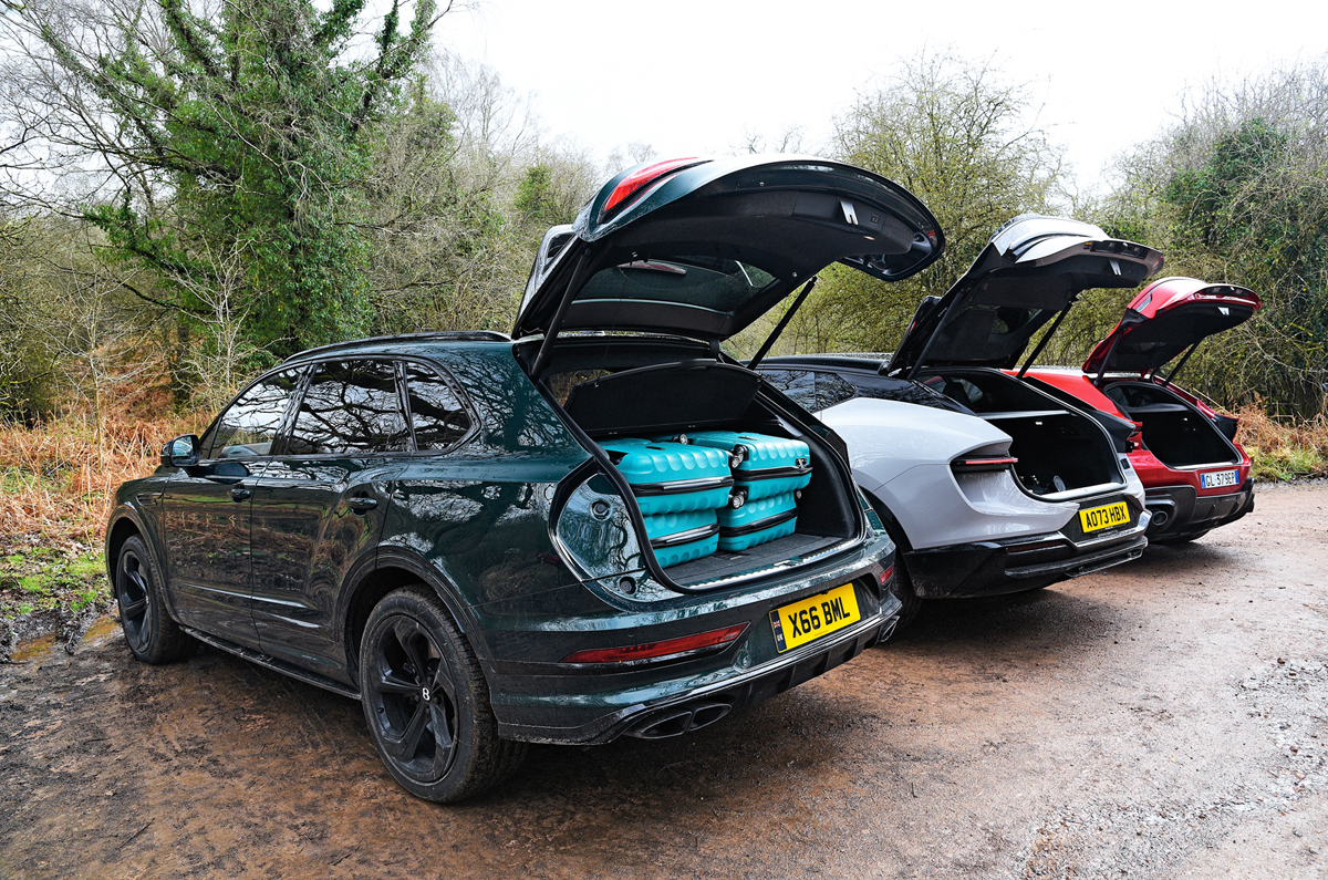 Bentley Bentayga with Lotus Eletre and Ferrari Purosangue boots open