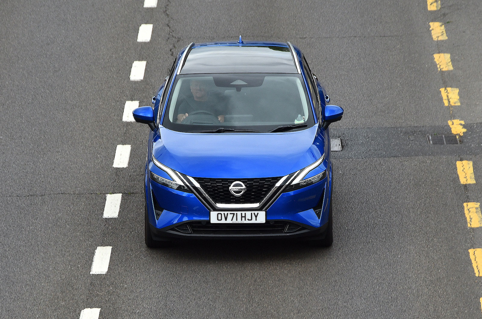 Blue Nissan Qashqai front driving