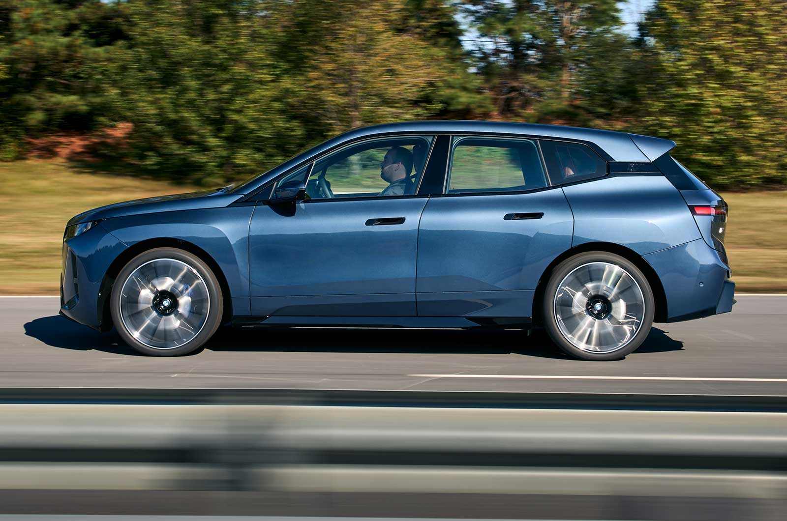 BMW iX side driving
