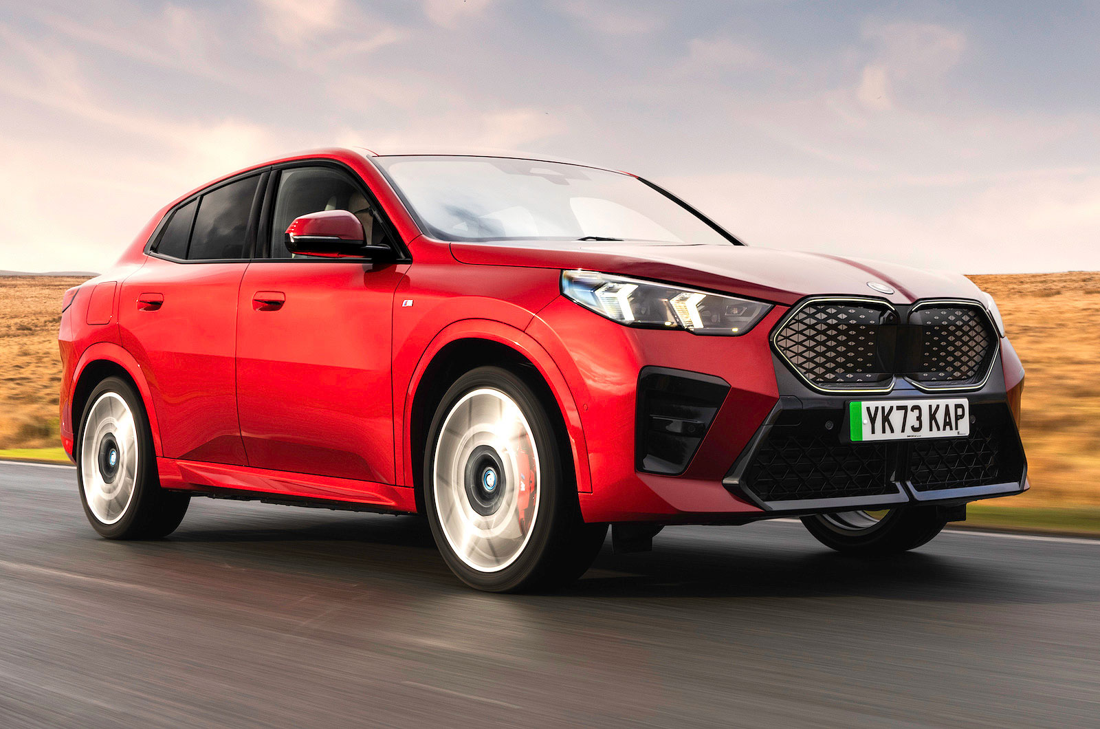 BMW iX2 front right driving