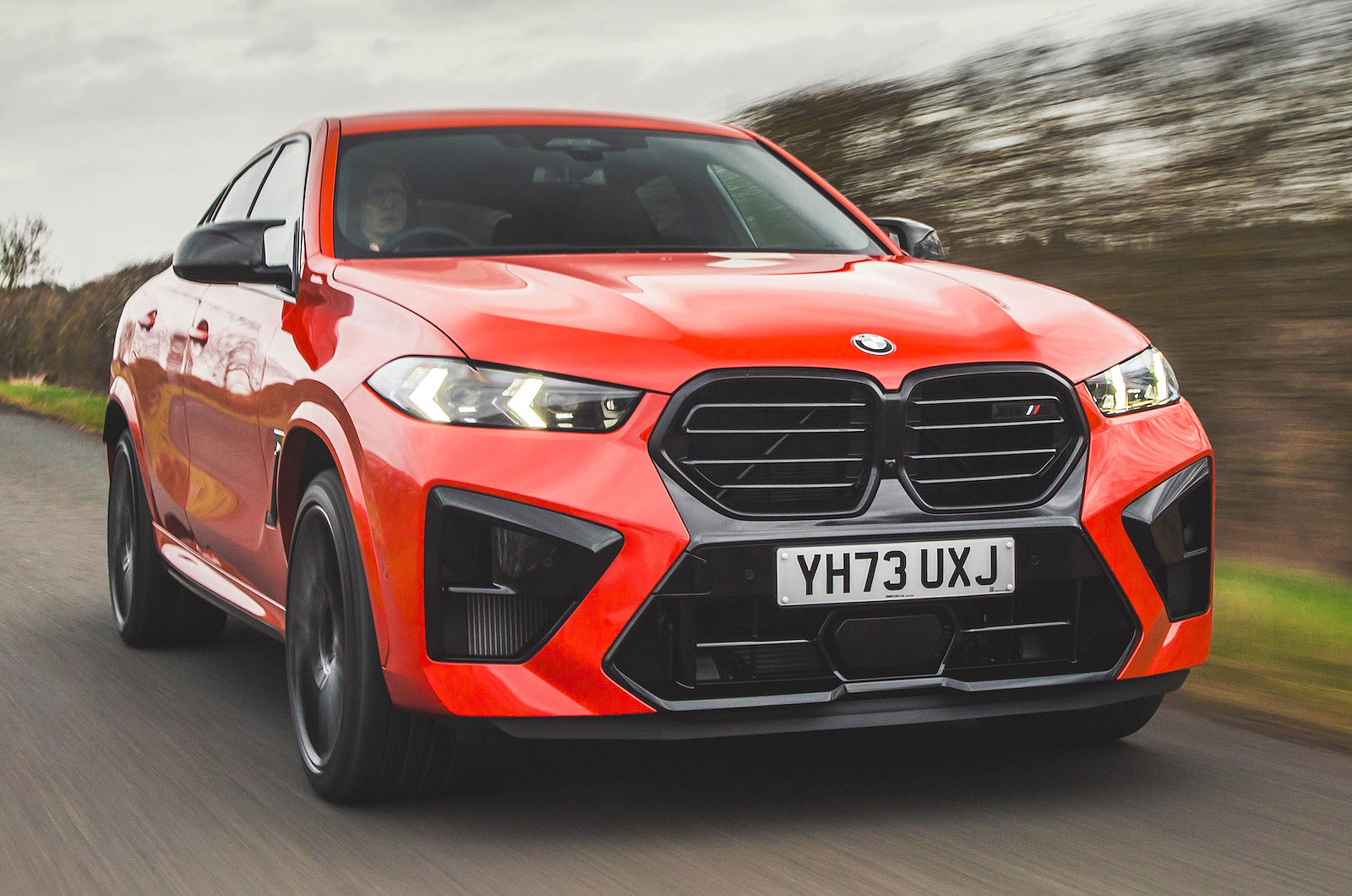 BMW X6 M Competition front right driving