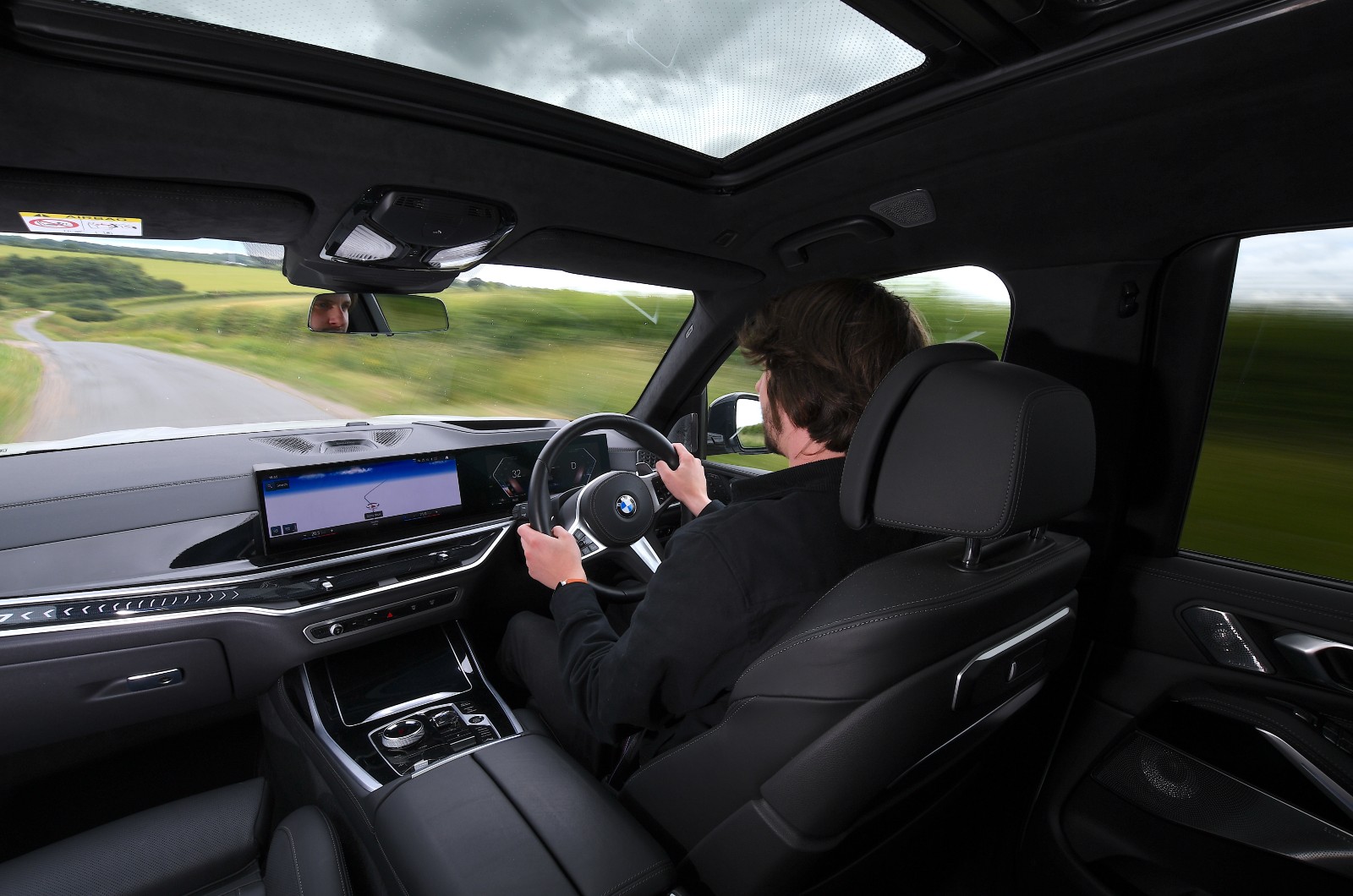 BMW X7 behind the wheel
