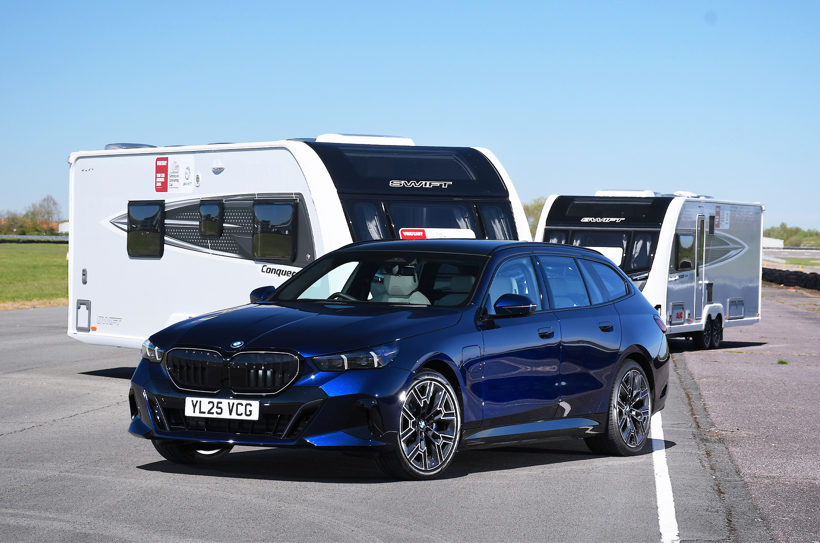 BMW 5 Series Touring front static with caravans