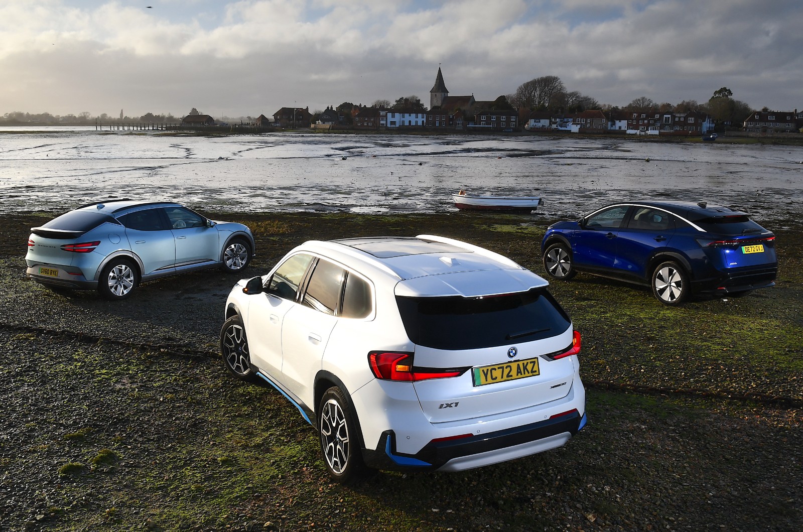 New BMW iX1 vs Genesis GV60 vs Nissan Ariya rear triple