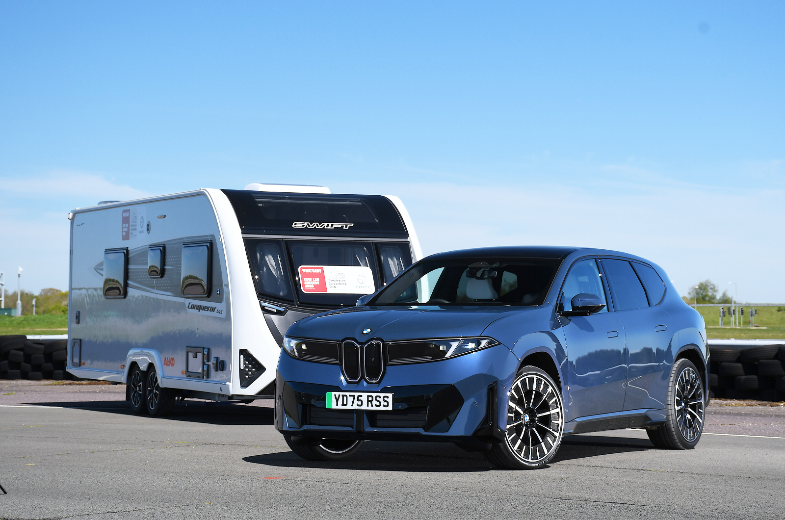 BMW iX3 front static with caravan