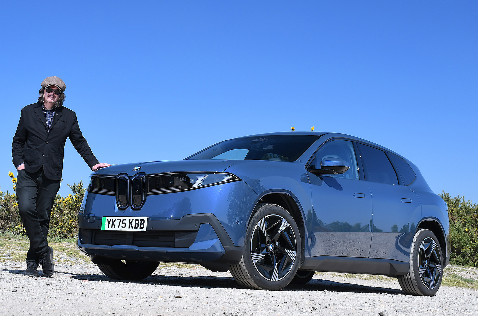 BMW iX3 Mark and car