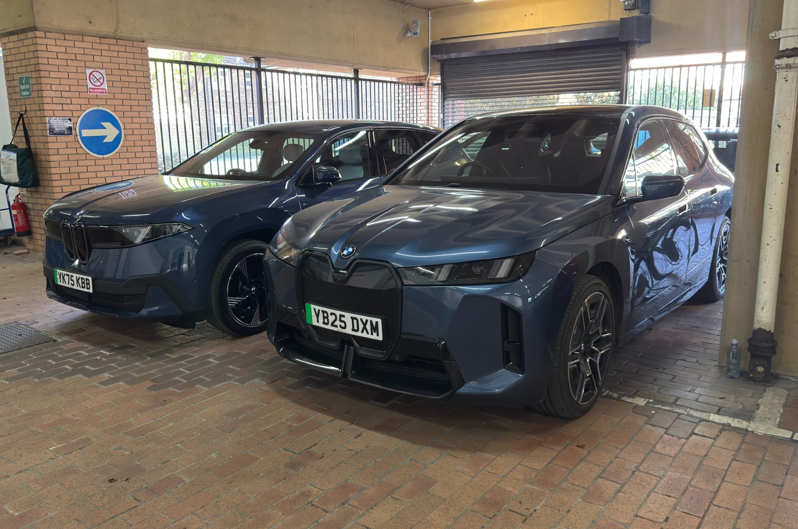 BMW iX parked in tight parking space