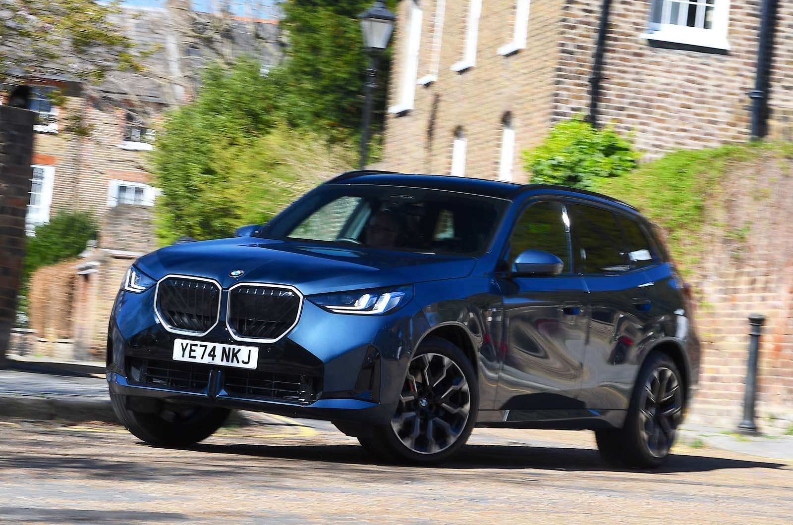 BMW X3 LT front cornering in town