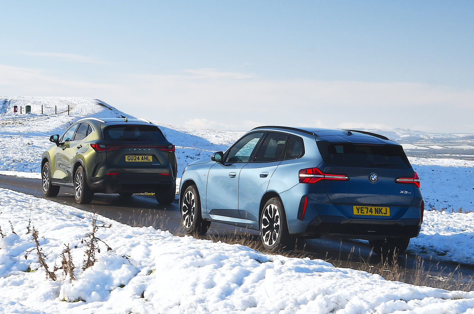 BMW X3 vs Lexus NX rears driving