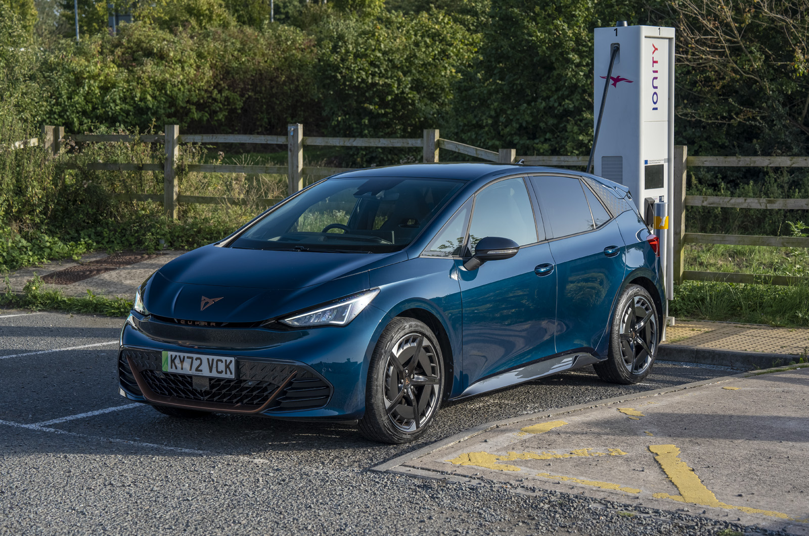 CUPRA Born front three quarters at public charging point