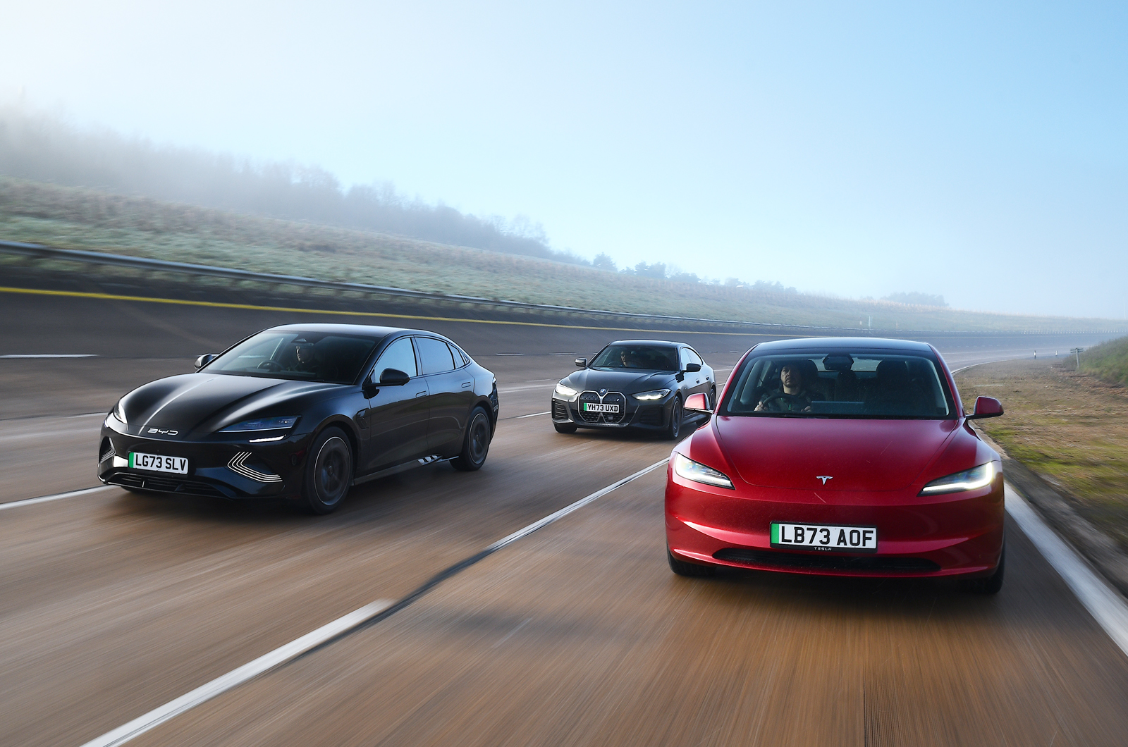 BYD Seal vs BMW i4 vs Tesla Model 3 front driving