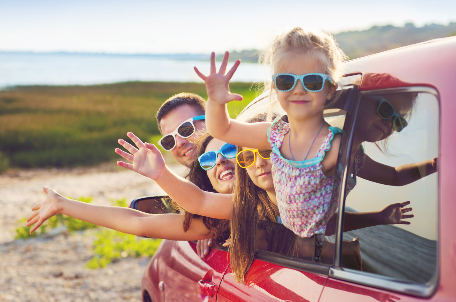 Car hire family in car on holiday