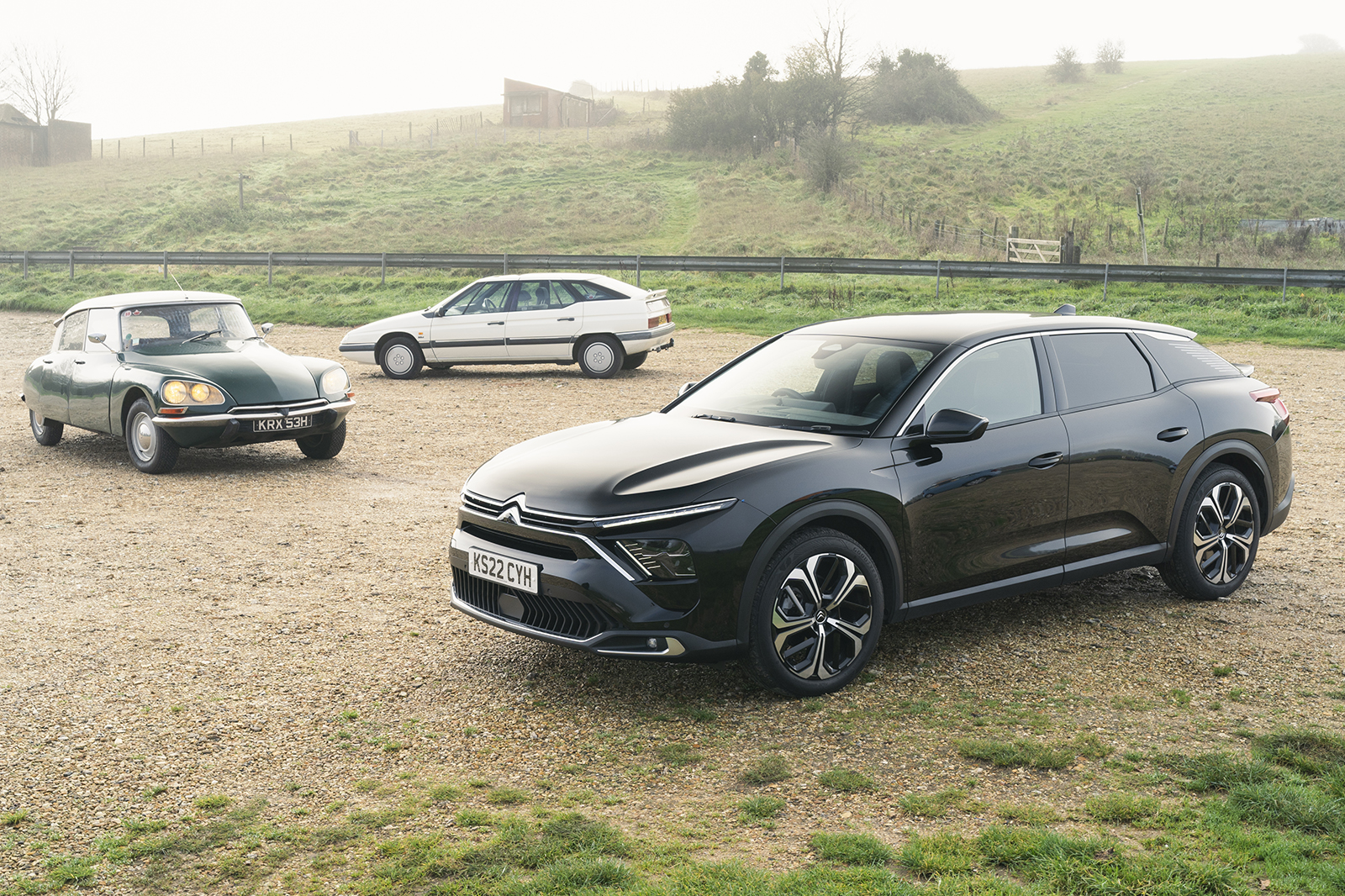 Citroen C5 X in front of older Citroens