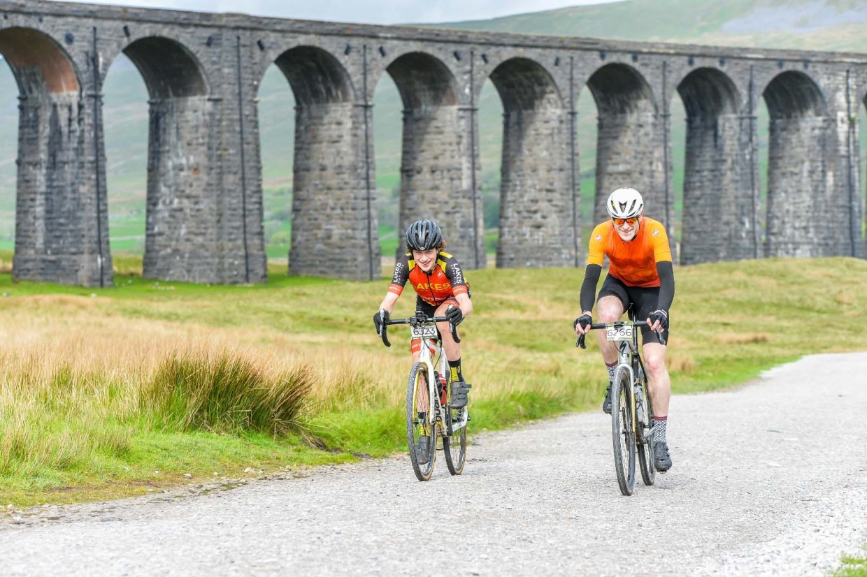 People riding e-bikes