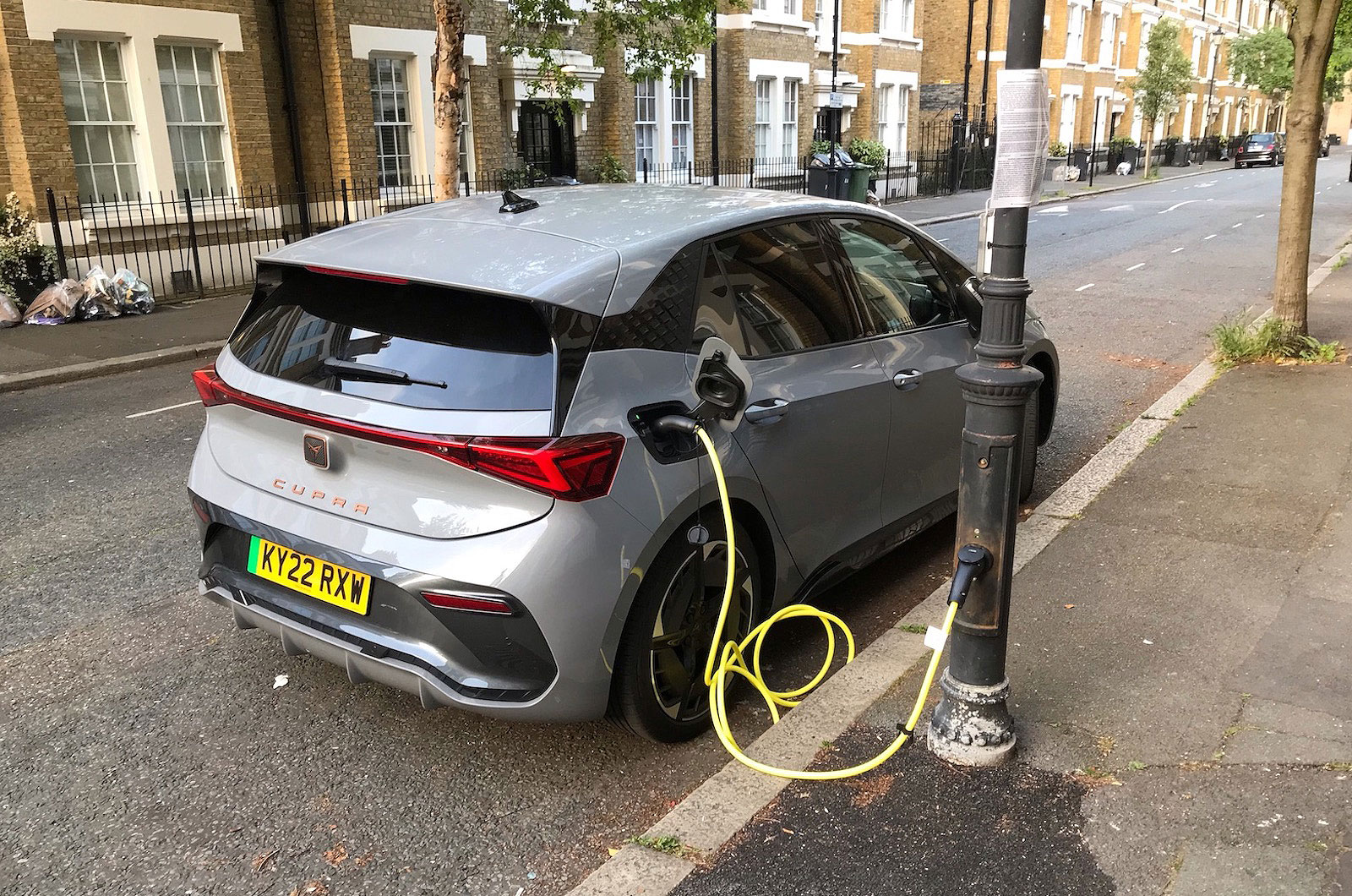 Cupra Born charging in the street