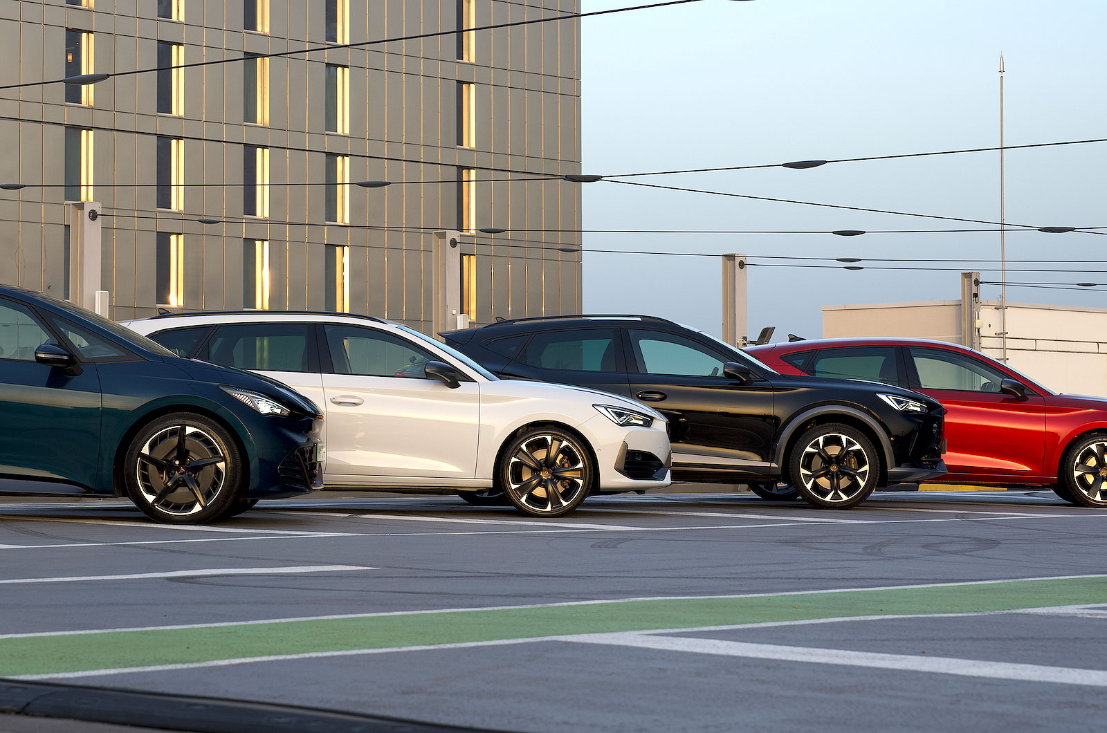 Four Cupra car models parked together