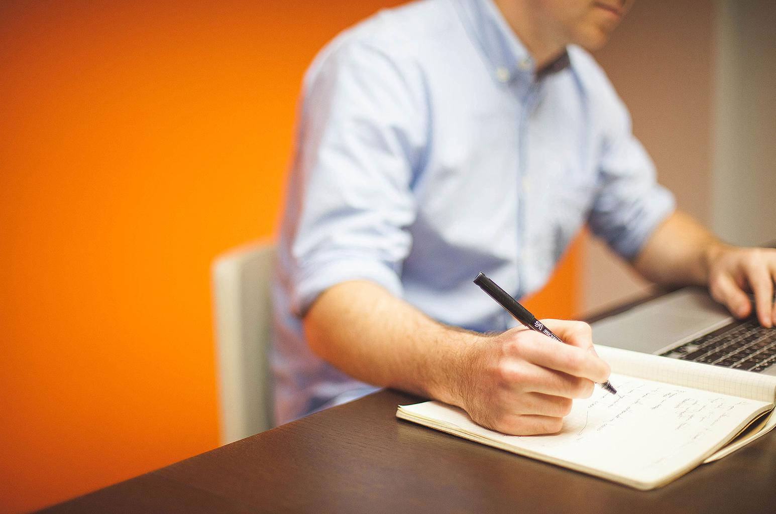 Buyer signing a document