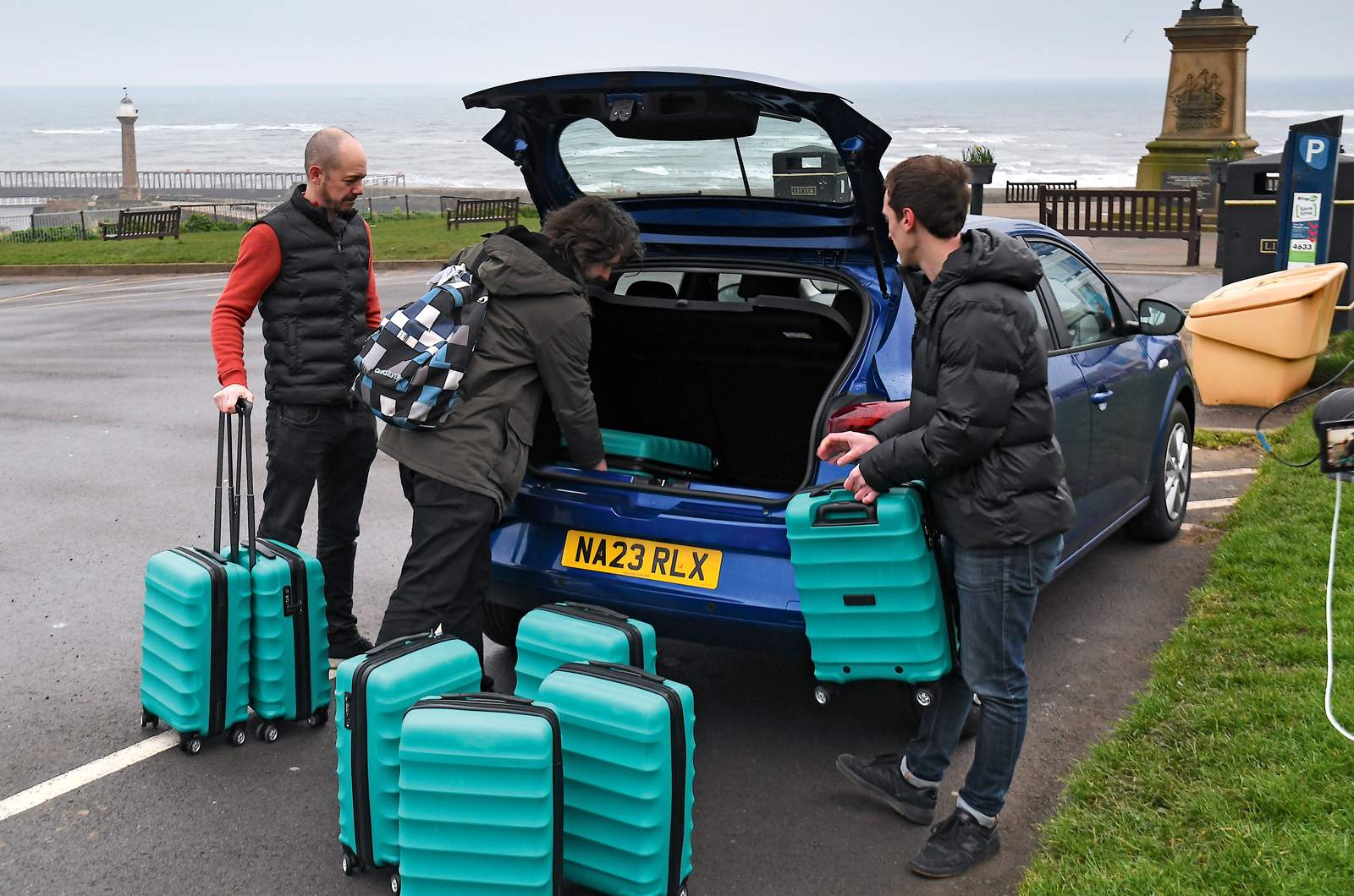 Dacia Sandero boot being filled with luggage
