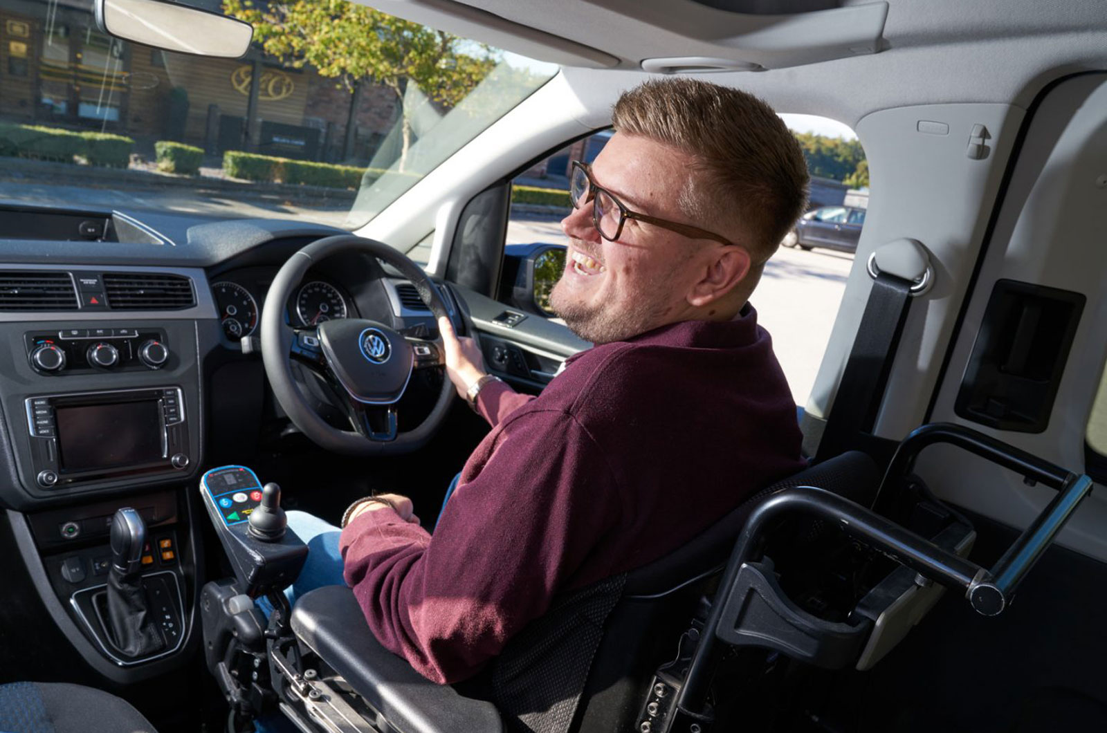 Disabled driver in car